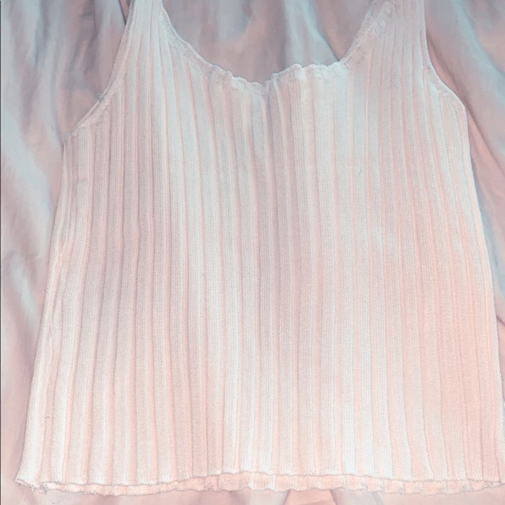 a white ribbed tank top